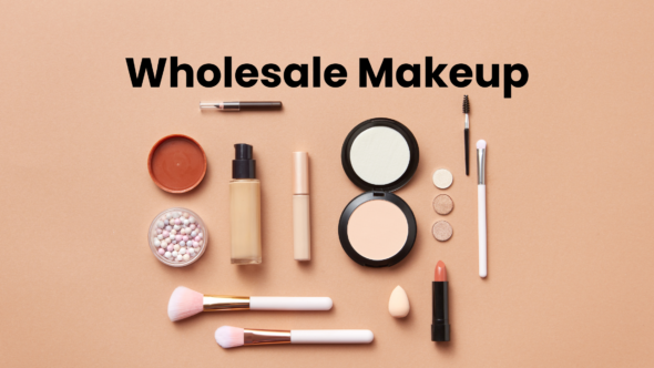Brushes, eyeshadow palettes, and lipsticks are among the wholesale makeup displayed on a brightly lit vanity table.